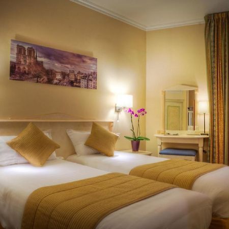 Hotel Louvre Sainte Anne París Habitación foto