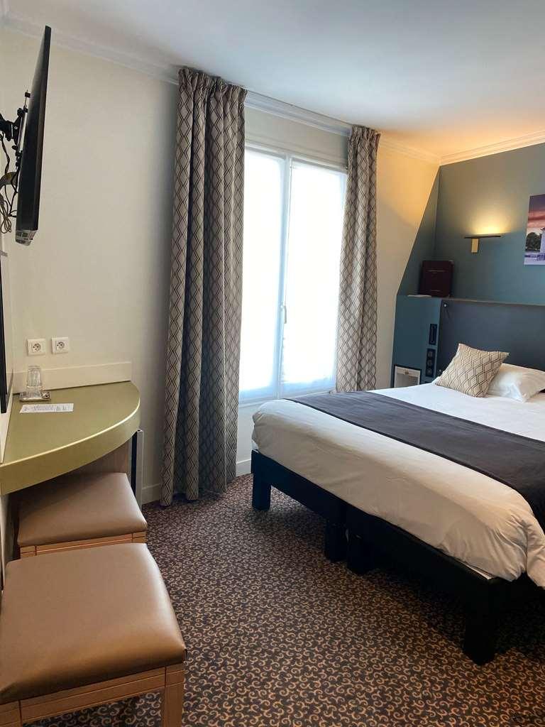 Hotel Louvre Sainte Anne París Habitación foto
